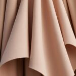 découvrez la couleur nude, ses différentes nuances et nos conseils pour bien la choisir selon votre style et votre carnation.